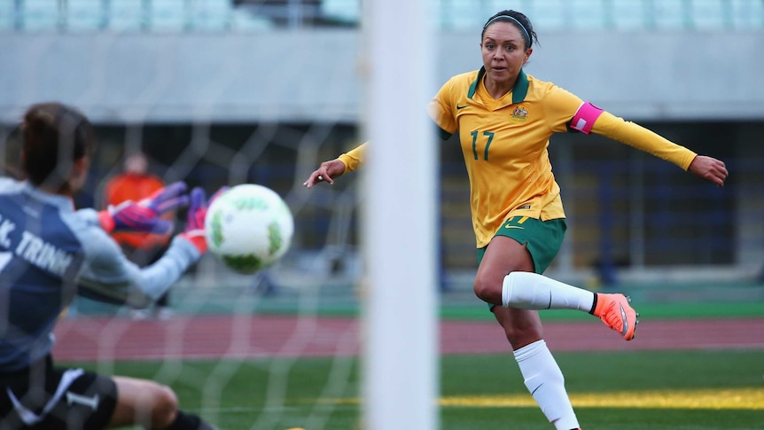 Australia's Kyah Simon scores goal against Vietnam in women's Olympic football qualifier in Osaka.