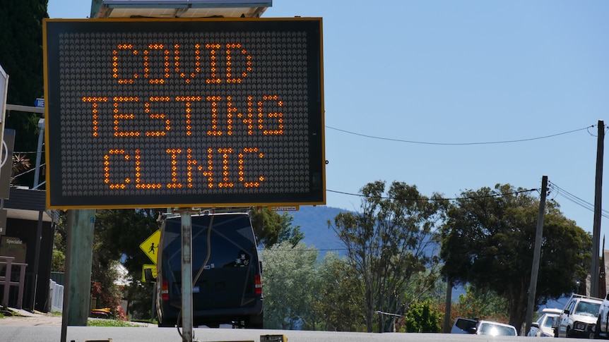 A COVID-19 testing clinic sign.