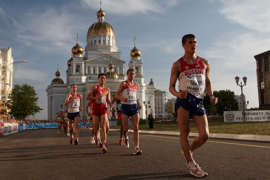 Russia's Vladimir Kanaykin and Valery Borchin and China's Zhen Wang in the men's 20km walk.