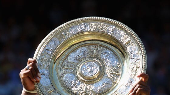 'I'm so blessed'...Serena Williams hoists the Wimbledon silverware.