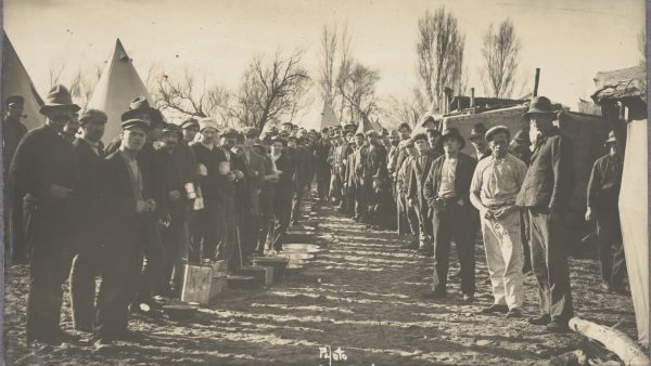 Internees lining up for water rations at the Torrens Island Internment Camp.
