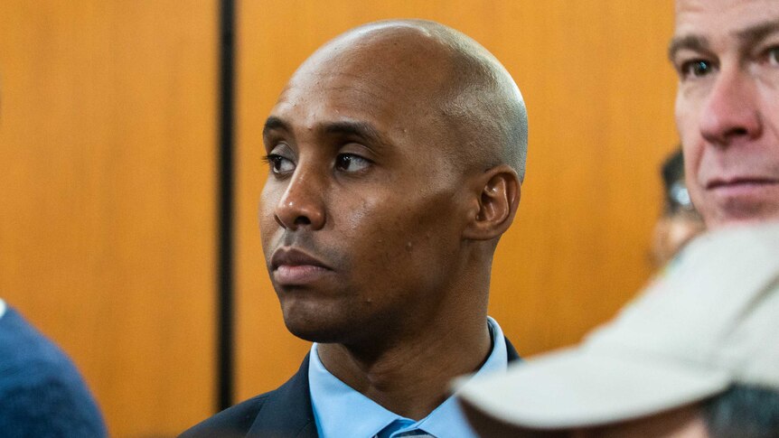 Mohamed Noor looks to the side in the courtroom in Minneapolis.