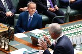 Bill Shorten listens to Malcolm Turnbull during Question Time