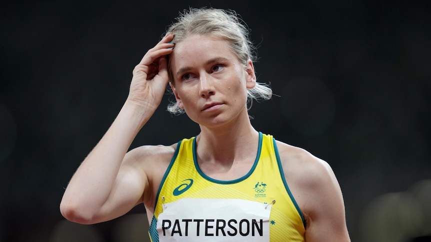 An Australian female high jumper composes herself at the Tokyo Olympics.