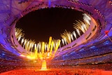 Fireworks explode over the National Stadium during the Beijing Olympic Games closing ceremony.