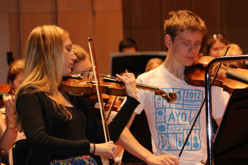 Violinist Annabelle Swainston (left) focuses during a practise session at Llewellyn Hall.