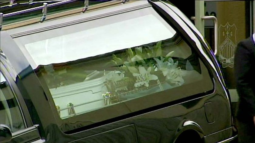 The coffin of Elliott Fletcher in a hearse outside St Patrick's College.