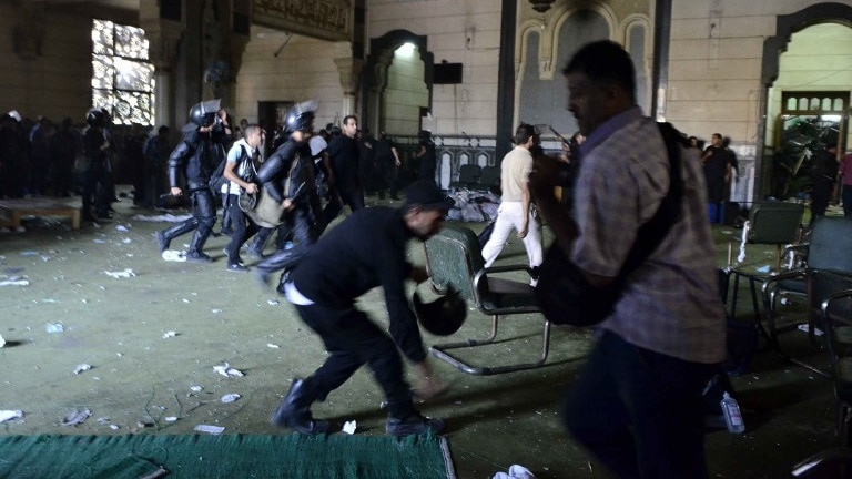 Egyptian riot police inside Cairo's Al-Fath mosque