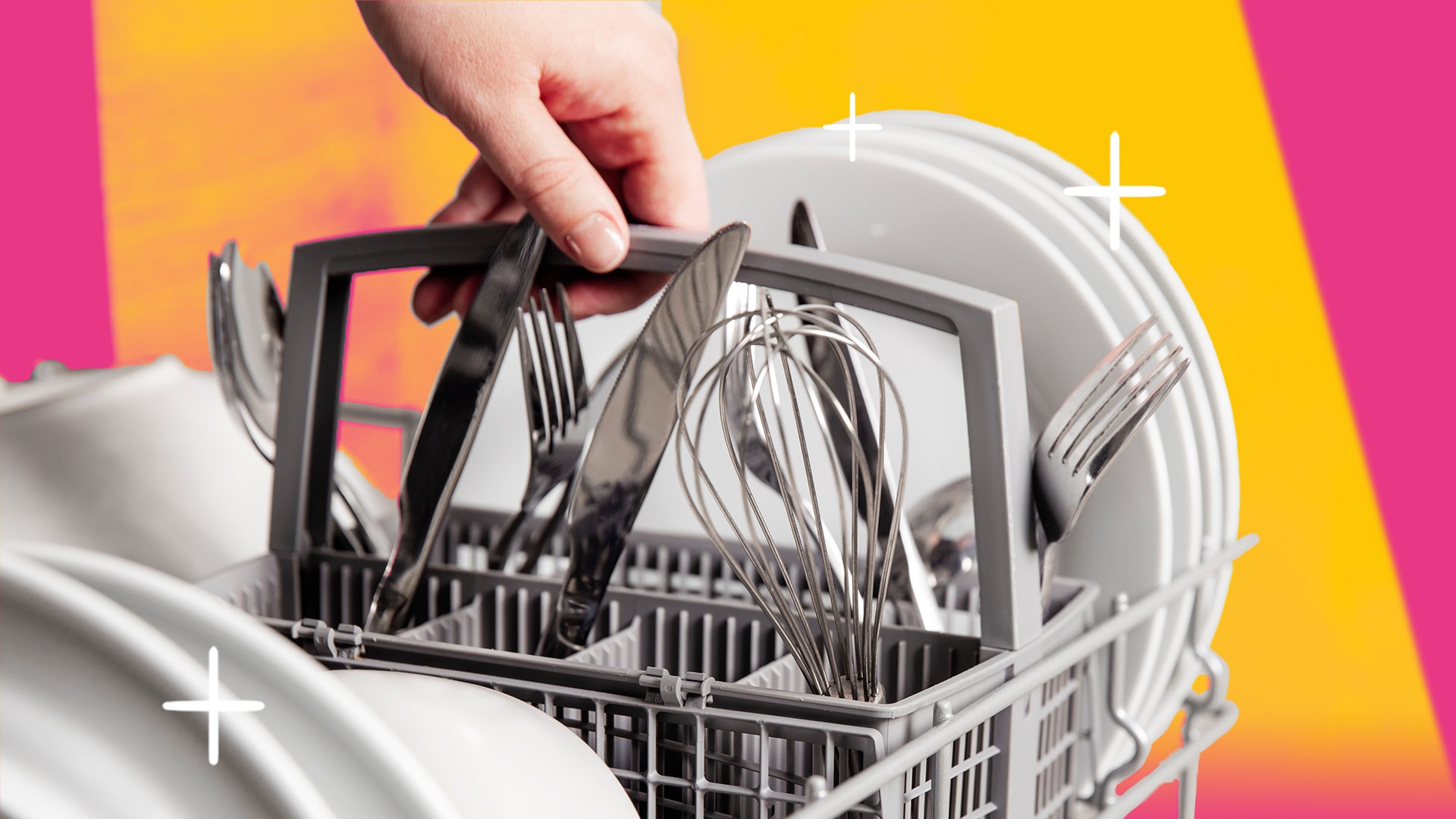 Woman's hand stacking dishwasher close up