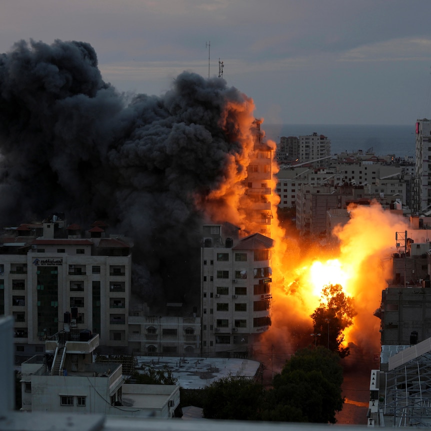 Building erupts into flames in Gaza