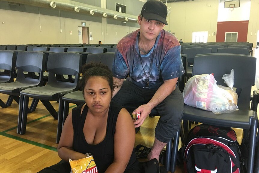 Sophia Hamilton and Matthew Harrigan wait for Debbie in Townsville shelter