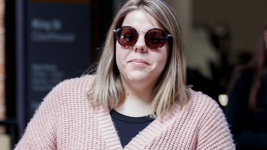 A woman wearing sunglasses