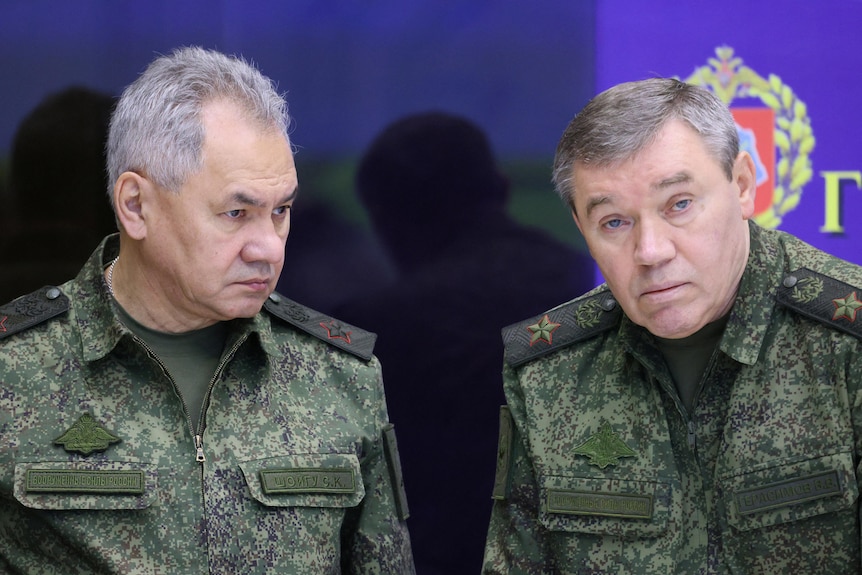 Russian Defence Minister Sergei Shoigu and Chief of the General Staff Valery Gerasimov stand together.