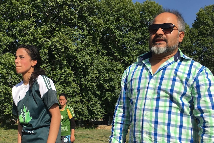 J&K chief rugby coach Irfan Aziz Botta with another young girl