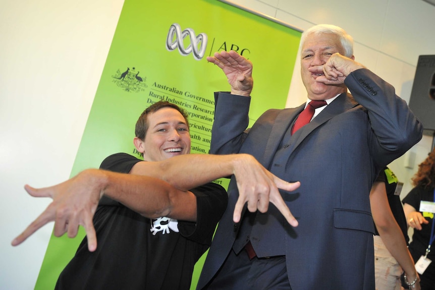 Bob Katter striking a rap pose with a Heywire winner.