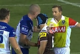 Free to play ... David Klemmer makes contact with referee Ben Cummins against the Panthers