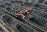 An aerial view of machinery moving coal from a terminal of Huanghua port.