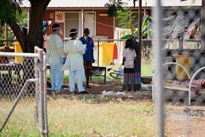 The NT Health COVID-19 rapid response team assesses the locked community in Rockhole on the outskirts of Katherine.