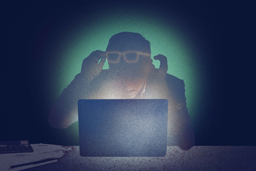 An illustration of a shocked man with both hands and glasses raised sitting at desk in front of a laptop in a dark room.