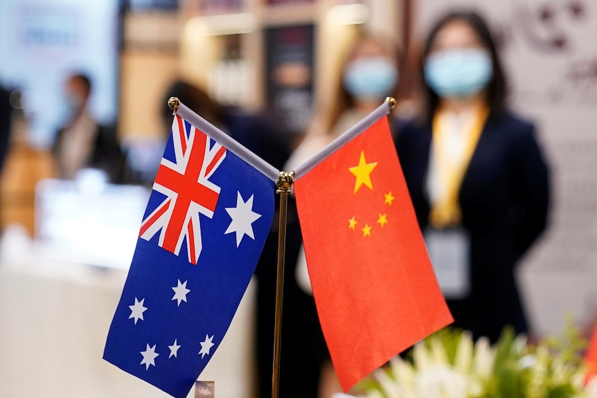 Chinese and Australian flags at an event in Shanghai