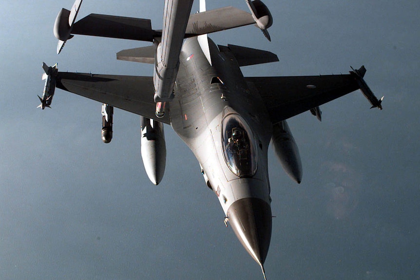 An F-16 from the Netherlands prepares to receive fuel from a KC-10A Extender.