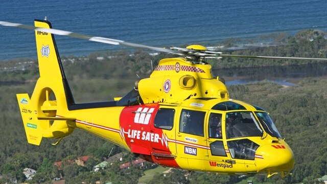 Westpac-branded rescue helicopter in the air