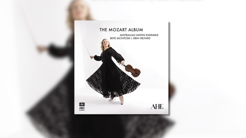 Skye Mcintosh poses in black gown with violin. Text is: The Mozart Album, Australian Haydn Ensemble, Skye McIntosh, Erin Helyard