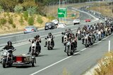 Rebels Motorcycle Club members escort the coffin of Richard John Roberts in March 2009.