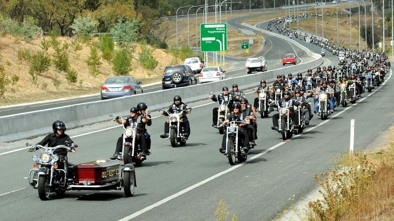 Rebels motorcycle club members escort the coffin of former Rebels WA leader Richard Roberts