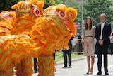 William and Kate meet Singapore's lion dancers