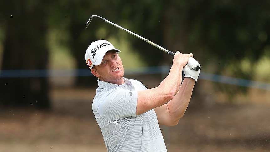 Lincoln Tighe of Australia plays a shot from the fairway