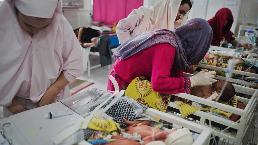 Newborns are examined in an Afghanistan maternity hospital.