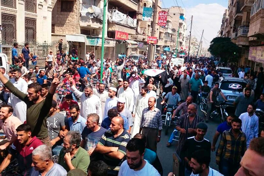 Protestors are seen.