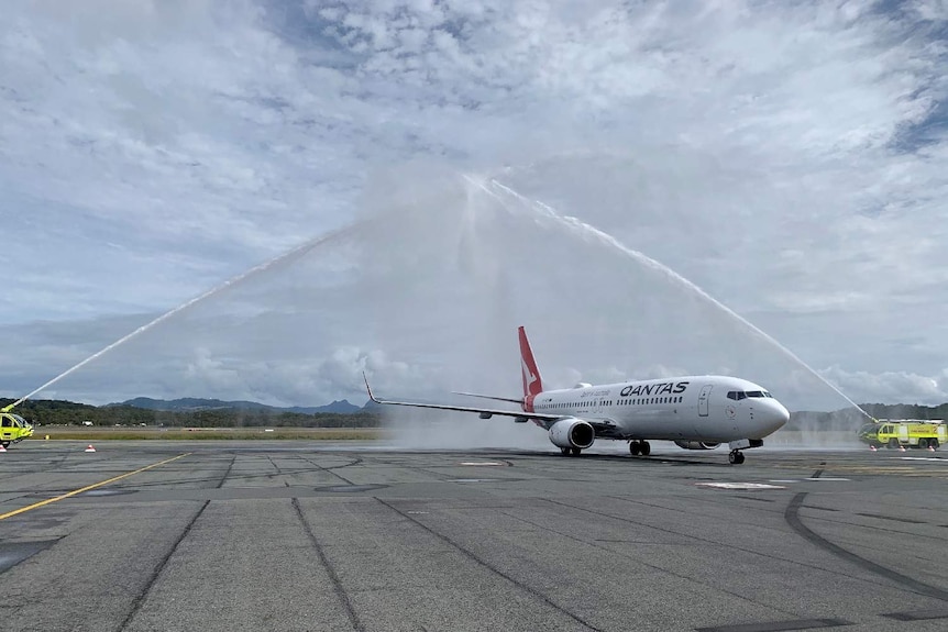 A water cannon salute to celebrate the first flight from interstate at Coolangatta airport today.