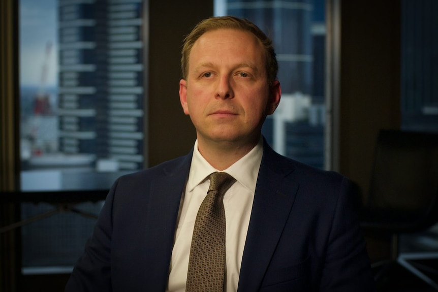 Jeremy Leiber seated in the boardroom of Arnold Bloch Leibler's Melbourne office.