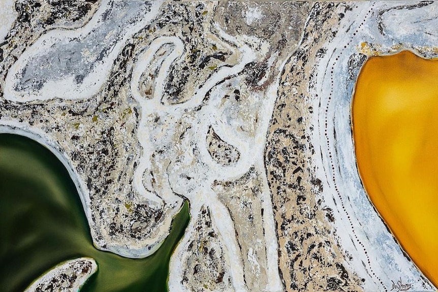 An aerial image of lakes and grassland