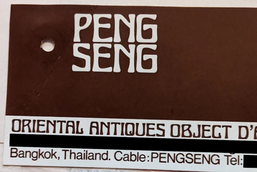 A business card with the name 'Peng Seng'