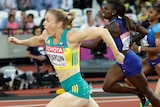 Sally Pearson looks surprised as she crosses the line to win the 100m hurdles at the World Championships.