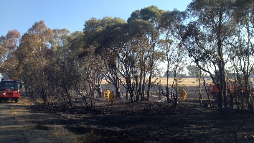 The grassfire has burnt out 76 hectares around Gundaroo Road, about 25 minutes from Canberra.