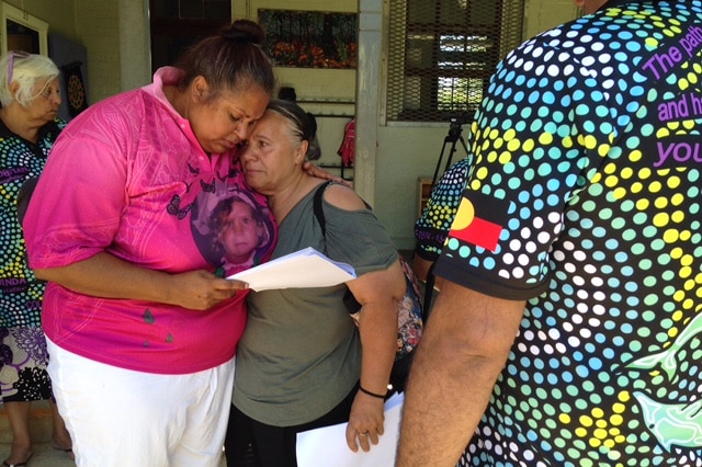 Michelle Jarrett is comforted by a relative, looking forlorn and disappointed.