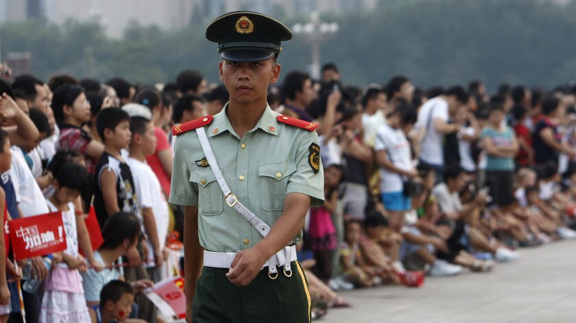 Chinese soldier marches in Tiananmen Square