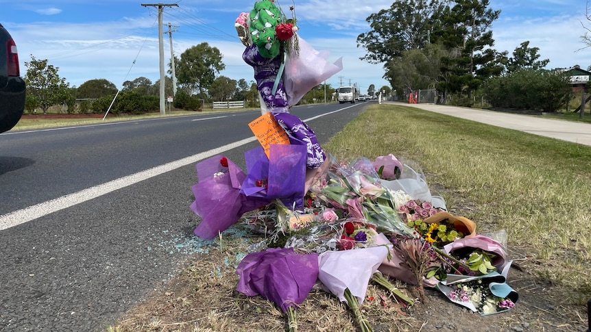 Flowers and tributes on the side of the road