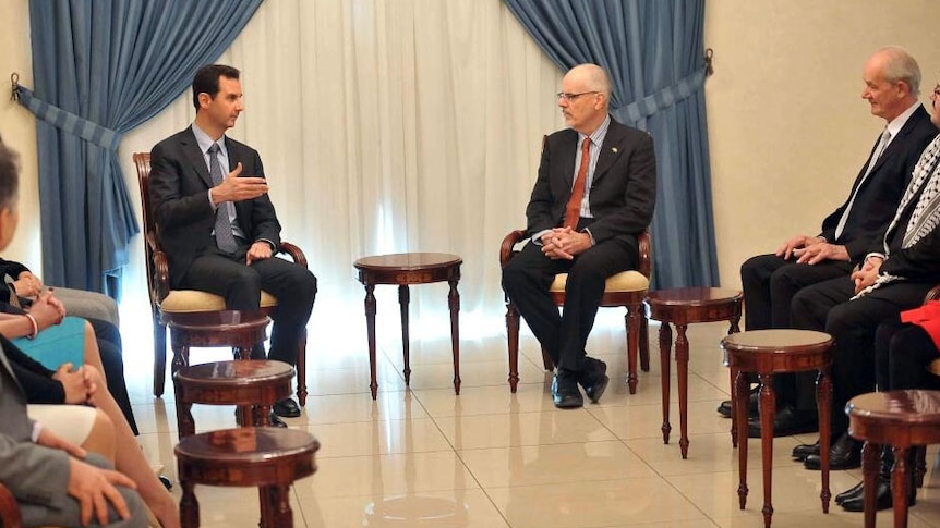 President Bashar al-Assad meets with Wikileaks delegation.