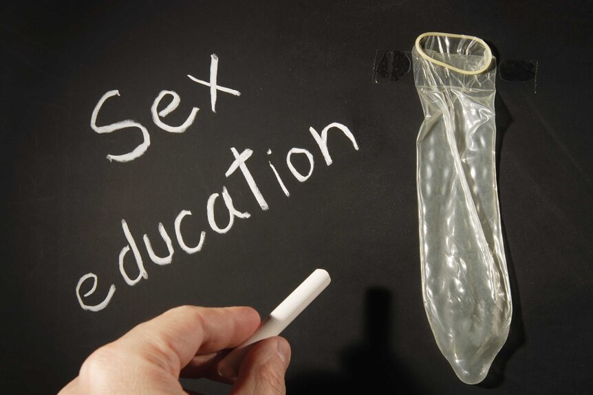 Condom fixed on blackboard