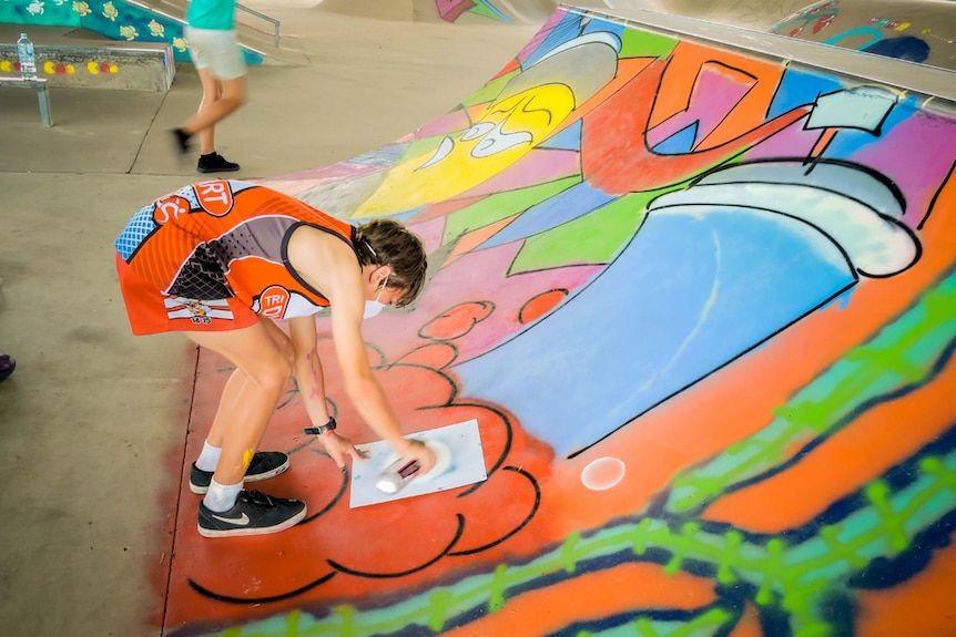 Youth spray-painting in Dysart