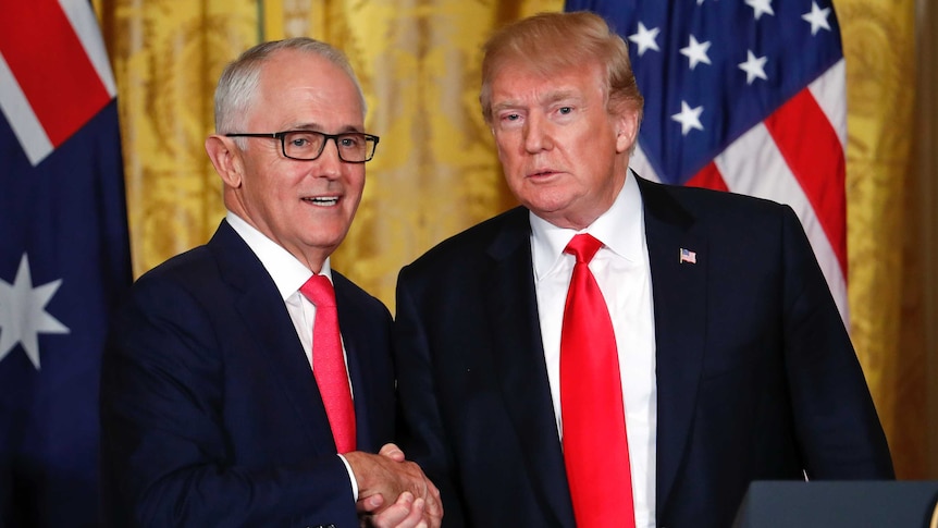 Donald Trump and Malcolm Turnbull shake hands at the White House.