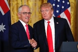 Donald Trump and Malcolm Turnbull shake hands.