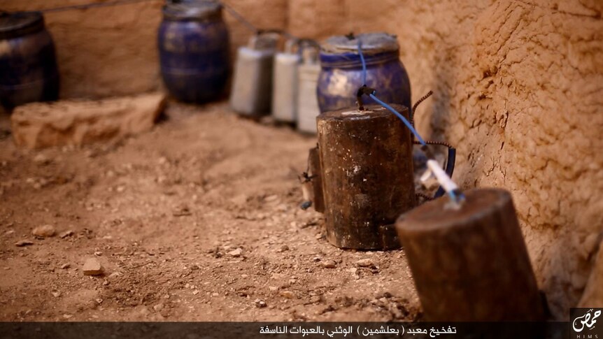 Explosive barrels and containers lined up in Palmyra