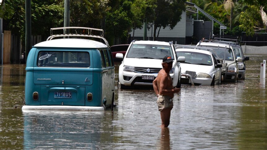 Vehicles partially submerged at Sandgate.