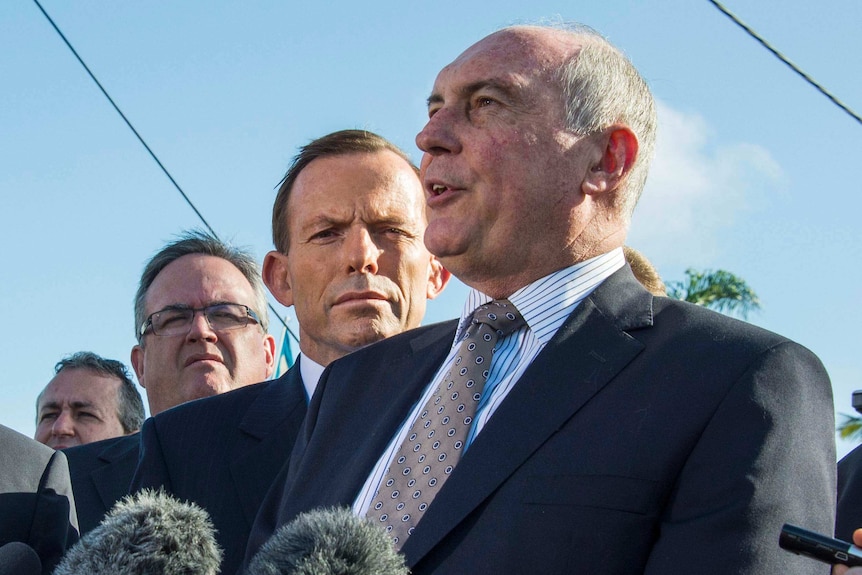 Federal National Party leader Warren Truss, alongside Opposition leader Tony Abbott